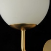 Immagine di Applique Moderna Erich Oro 1 Luce Sfera Vetro Bianco Maytoni