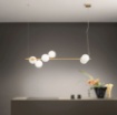 Picture of Lampadario Binario Oro Con Sfere Vetro Bianco Per Tavolo Pranzo Enoire Luce Ambiente Design