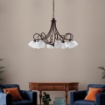 Immagine di Grande Lampadario Rustico con Bracci 8 Luci Dallas Ferro Battuto Nero Ruggine Be Light